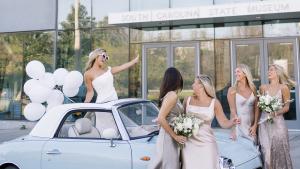 Bride and Bridesmaids With Convertible Outside Planetarium at the South Carolina State Museum