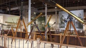 Row of antique telescopes on exhibition at the State Museum