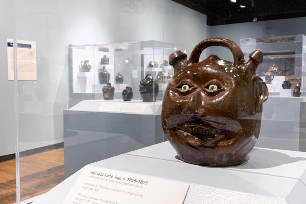 Face Vessels Exhibit Gallery with Harvest Jug in Foreground