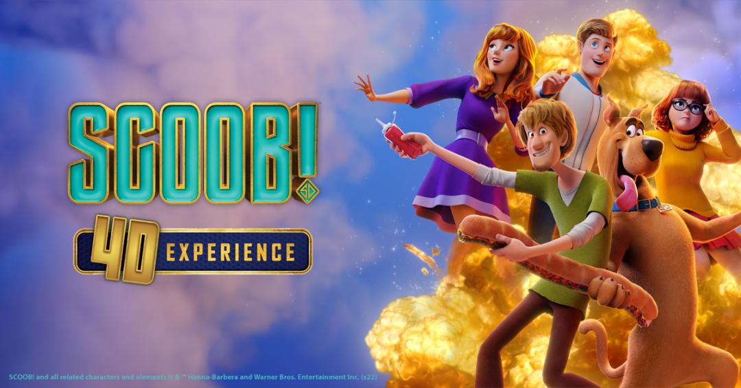 Scooby Doo, Shaggy, Velma, Fred and Daphne characters stand against a cloudy sky